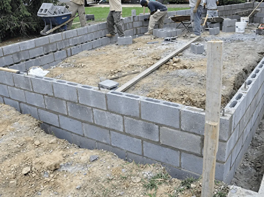 Professionals building a foundation with blocks in Baltimore, MD