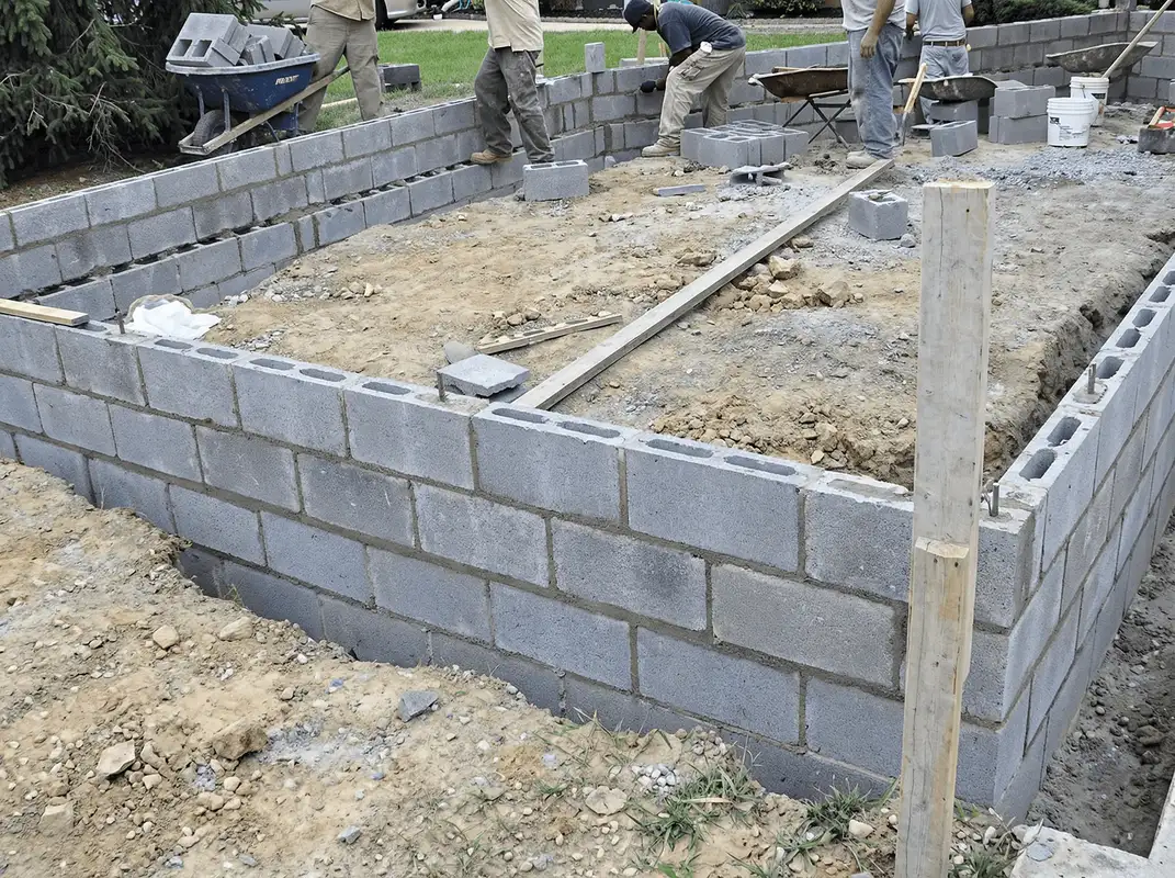 Professionals building a foundation with blocks in Baltimore, MD