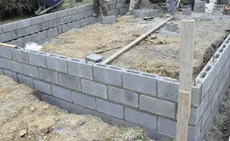Professionals building a foundation with blocks in Baltimore, MD